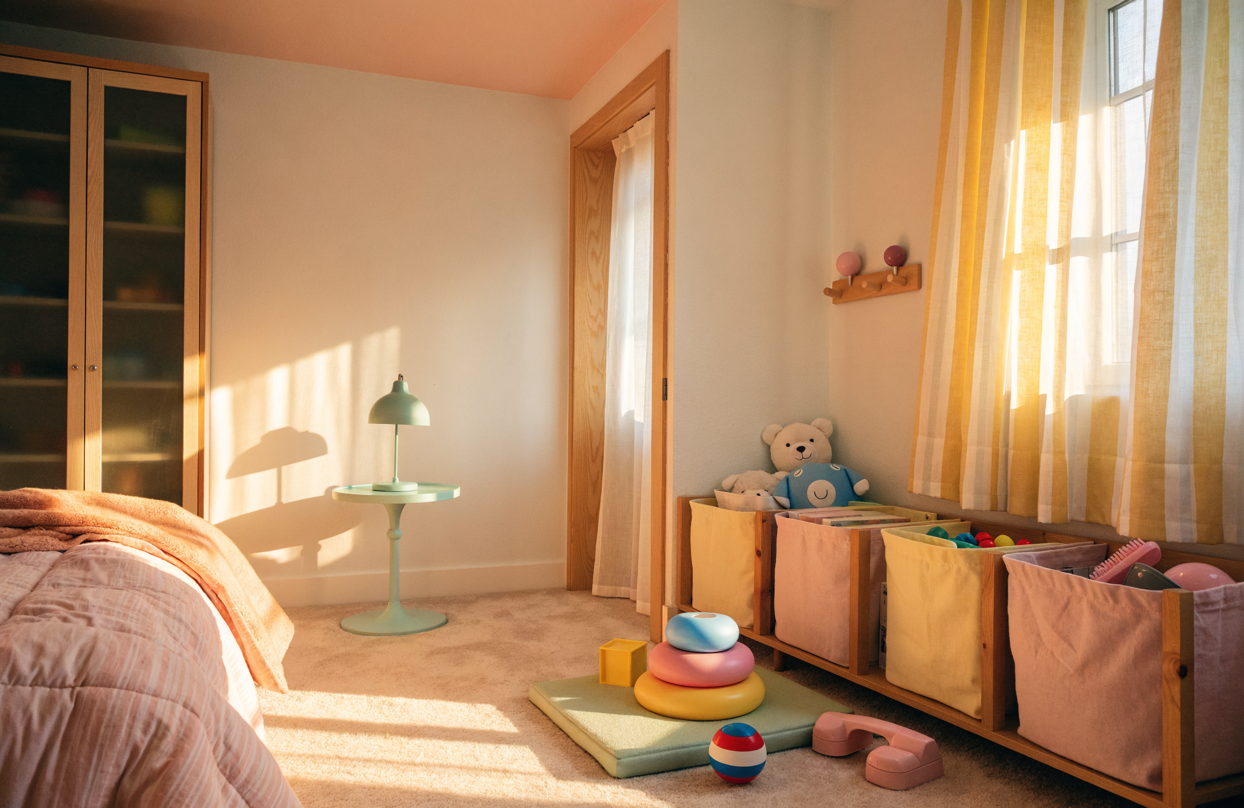 Illustrative image of a tidy child's playroom storage corner, representing Minimize With Joy home organising services in Singapore