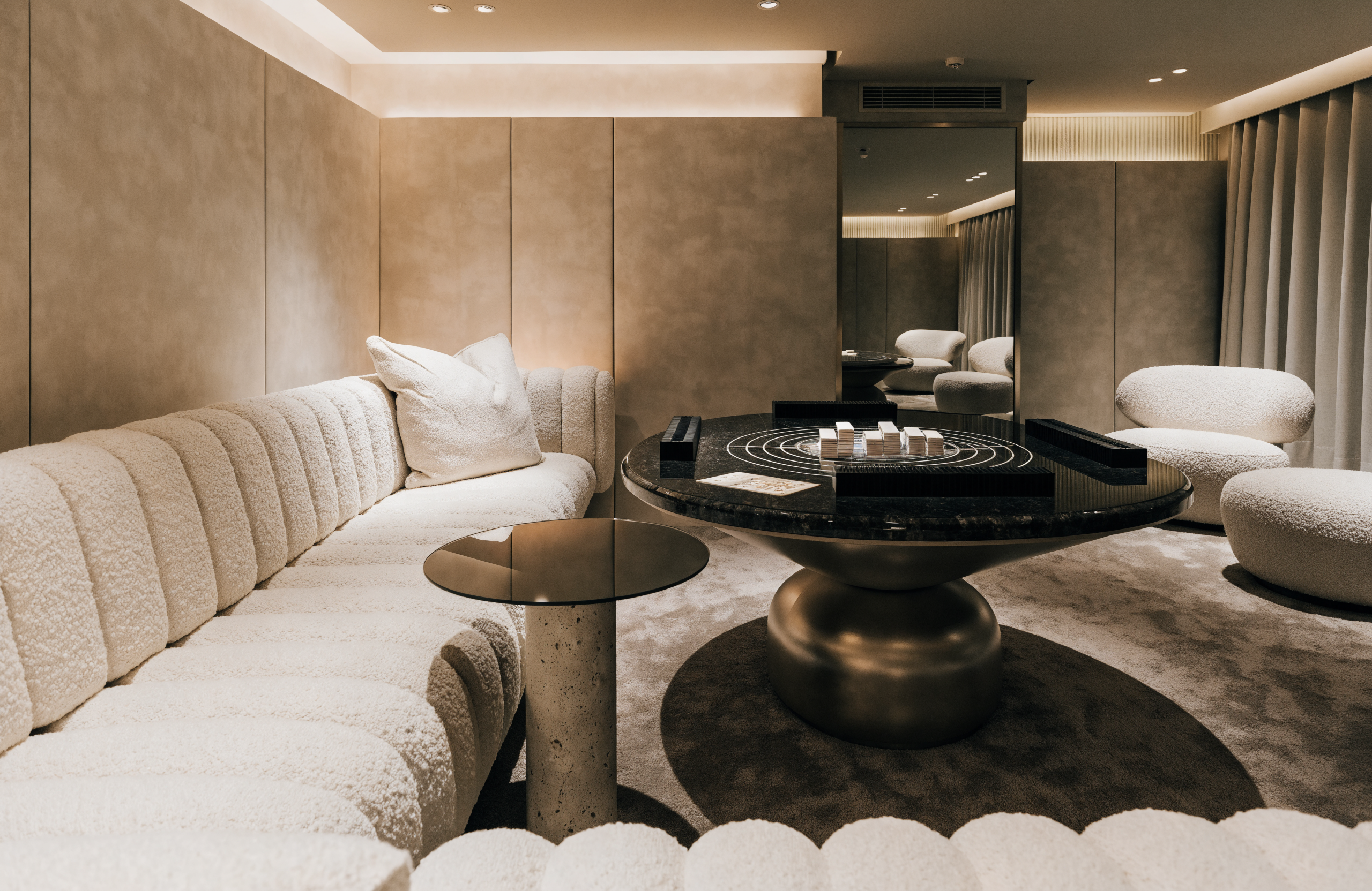 Illustrative image of a chic private lounge room with a mahjong table, representing Cosmo Place mahjong experiences in Singapore